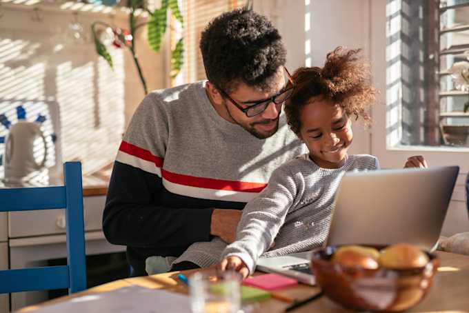 How to Keep Your Child Safe Online This School Year: A Parent’s Cyber Guide 6 rsz father and daughter using laptop and smiling 2022 02 02 04 50 38 utc 1