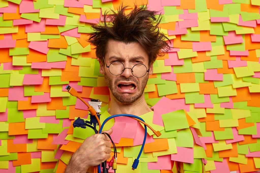 The Real Reason People Don’t Use Their Tech Effectively 7 close up young student surrounded by sticky notes